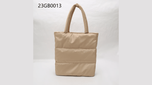 The Ultimate Guide to the Padded Nylon Mini Puffer Tote Bag with Adjustable Strap