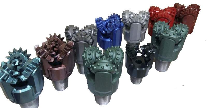 What types of drill bits are commonly used in coal mining operations?